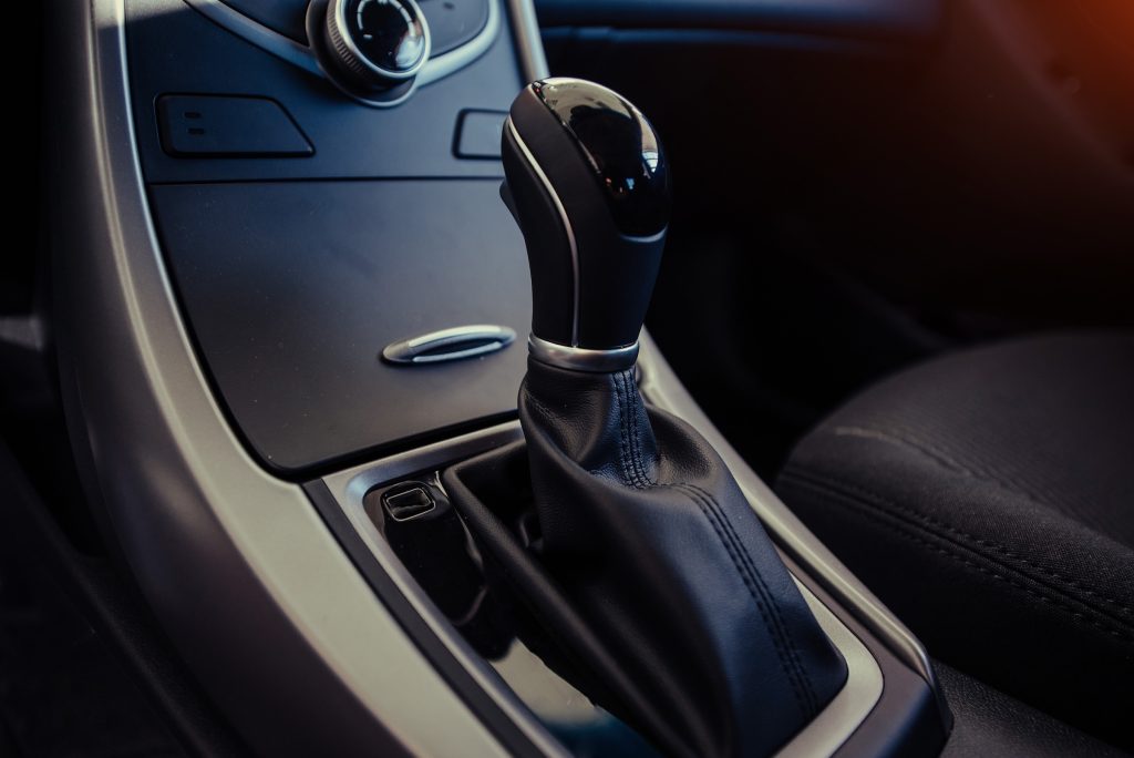 Modern car interior dashboard and steering wheel.